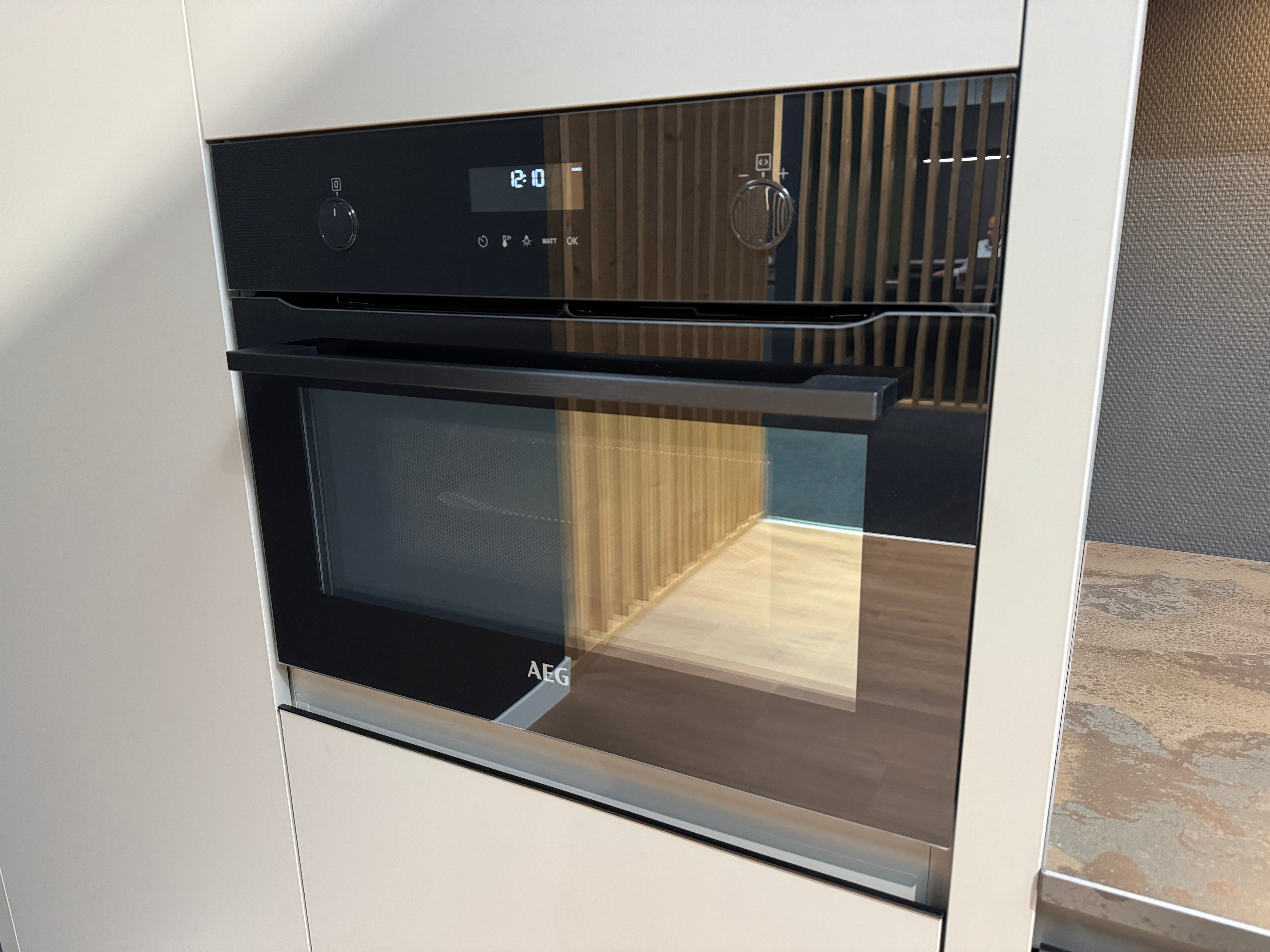 33983 - Grey island kitchen from Rotpunkt with Dekton top