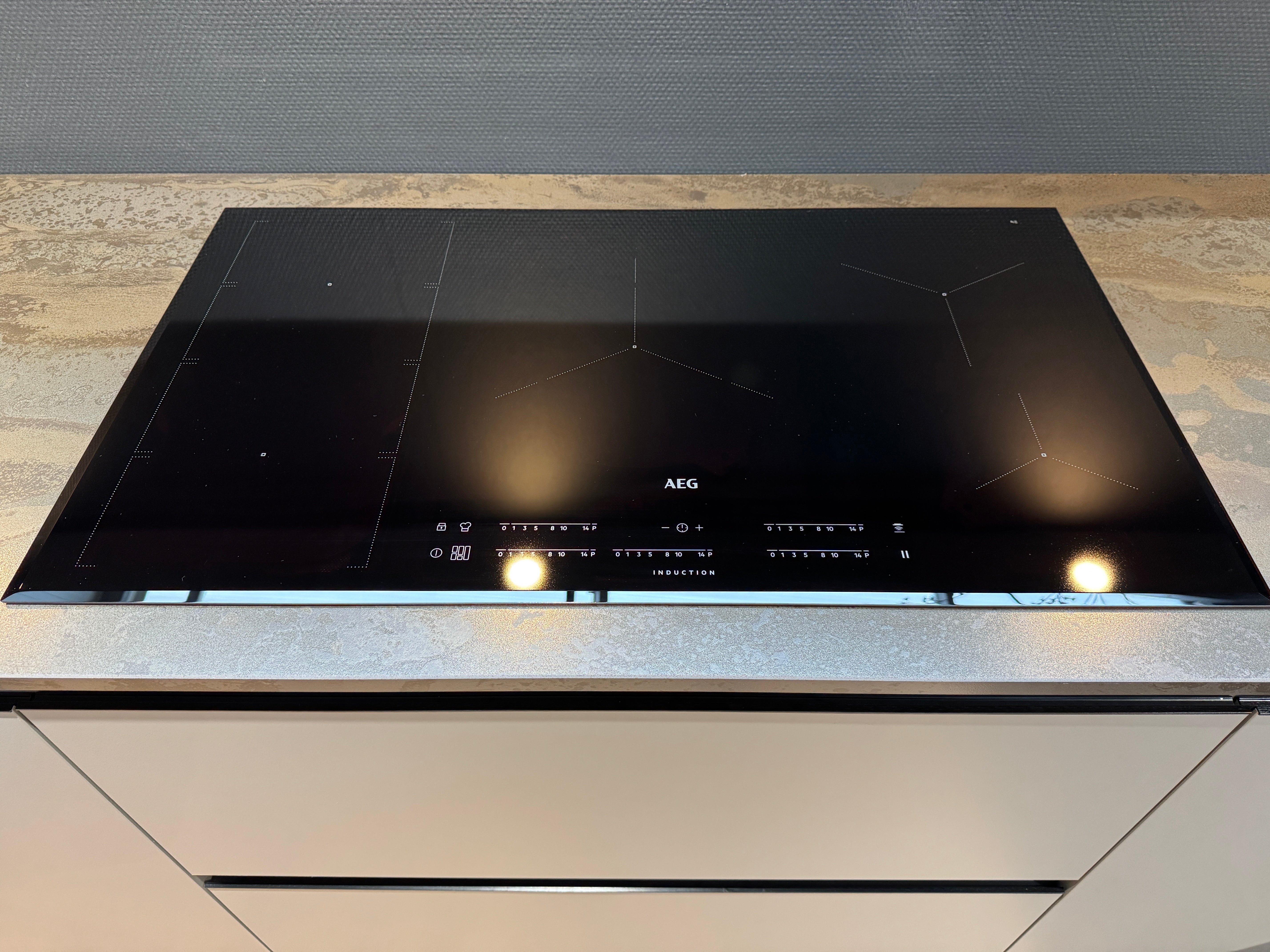 33983 - Grey island kitchen from Rotpunkt with Dekton top