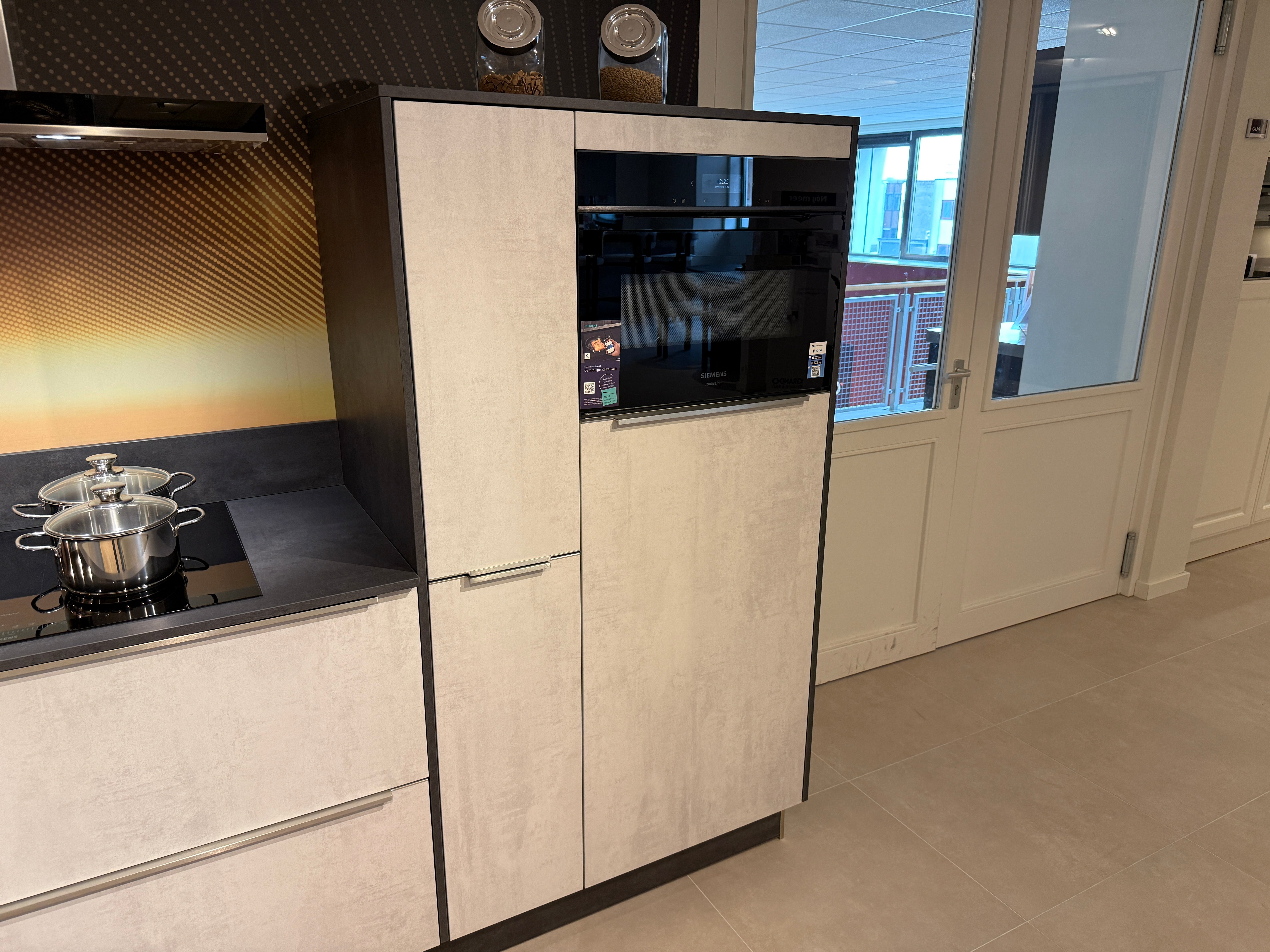 04047 - Häcker hoekkeuken in betonlook