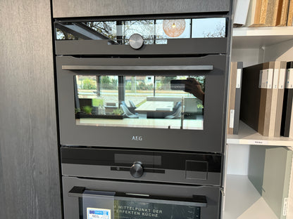 33974 - Siematic island kitchen with stone top 