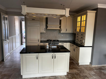 28280 - White country island kitchen with stone top 