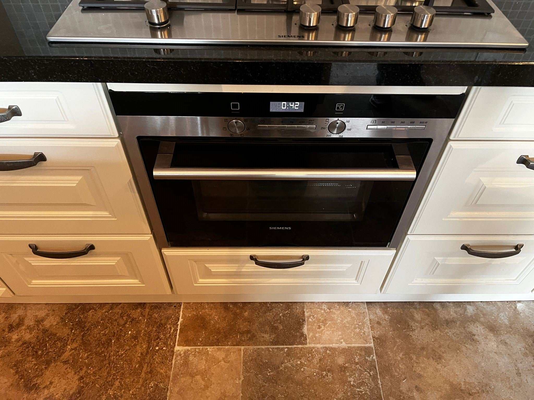 28280 - White country island kitchen with stone top 