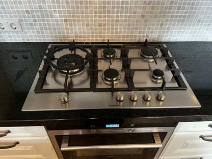 28280 - White country island kitchen with stone top 