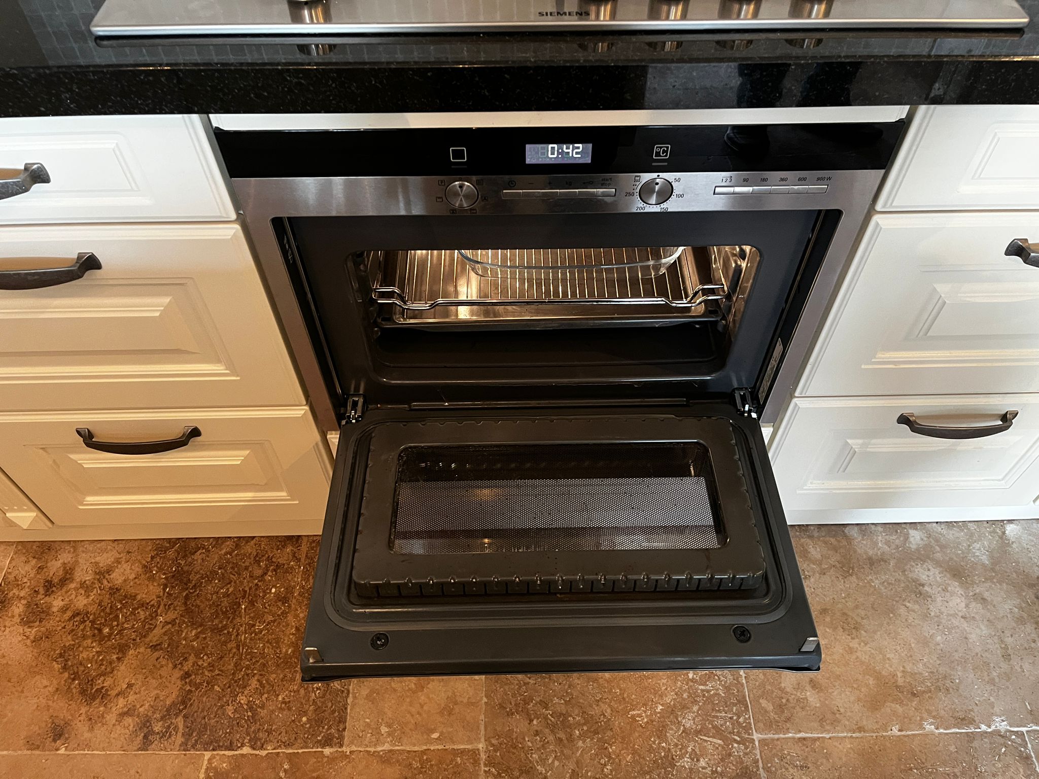 28280 - White country island kitchen with stone top 