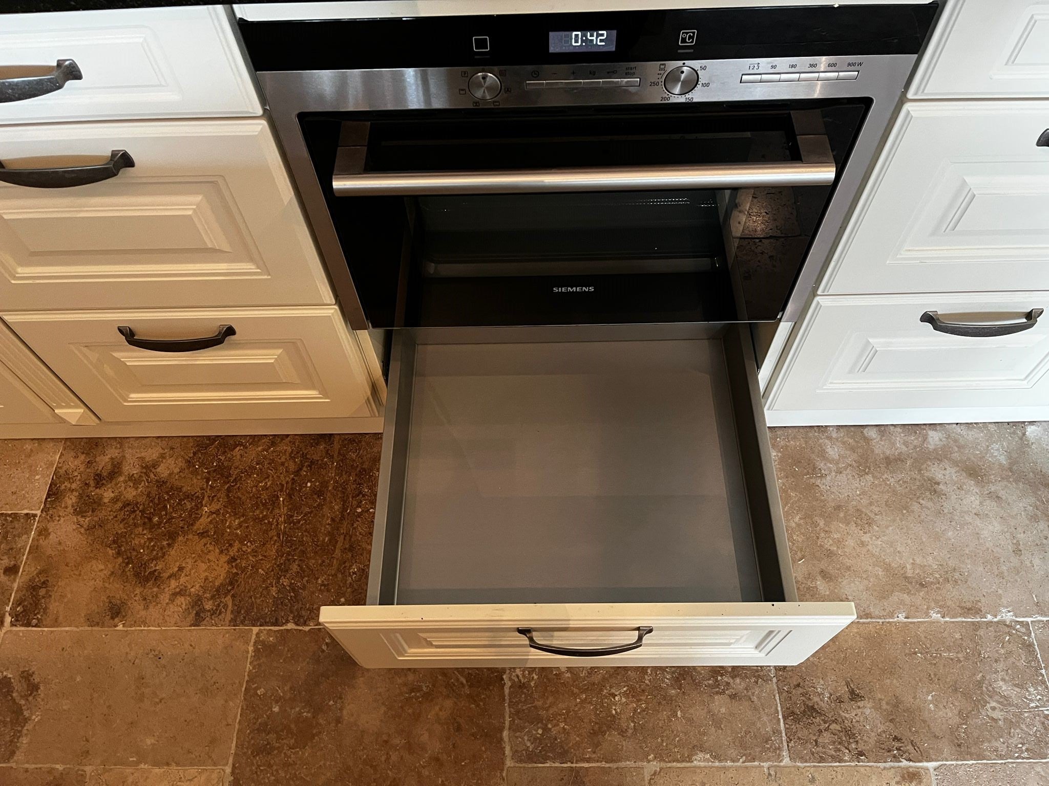 28280 - White country island kitchen with stone top 