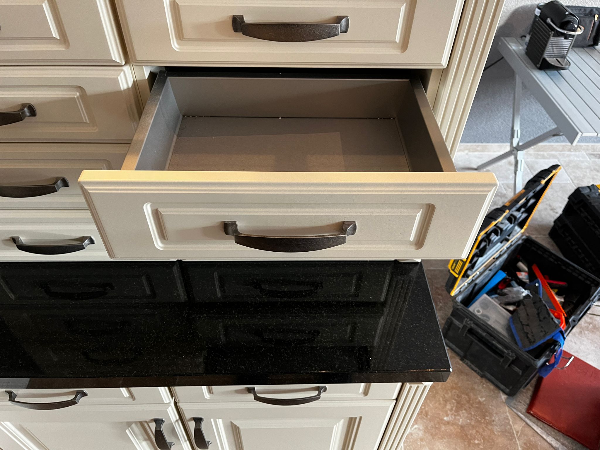 28280 - White country island kitchen with stone top 